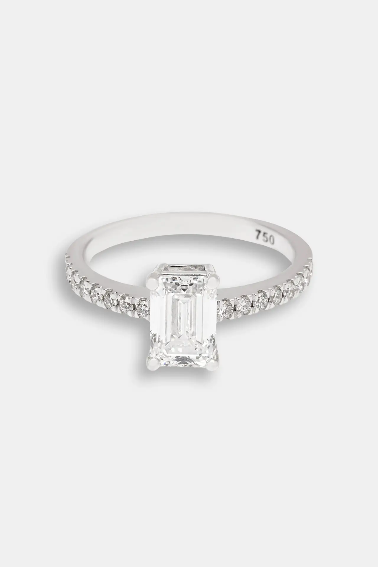 iris-emarald-cut-solitaire-ring